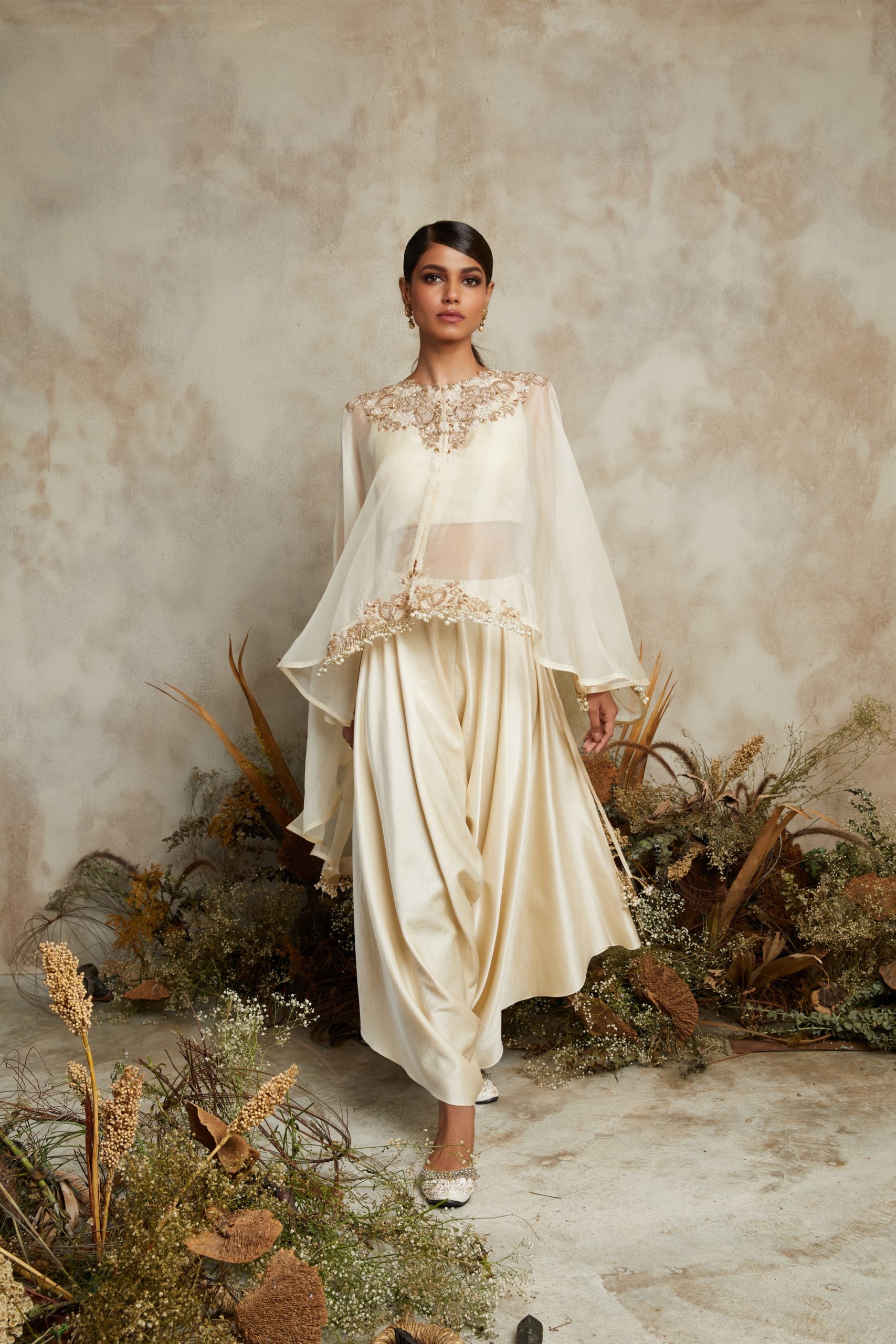 Organza umbrella cape with silk bustier and cotton satin pants