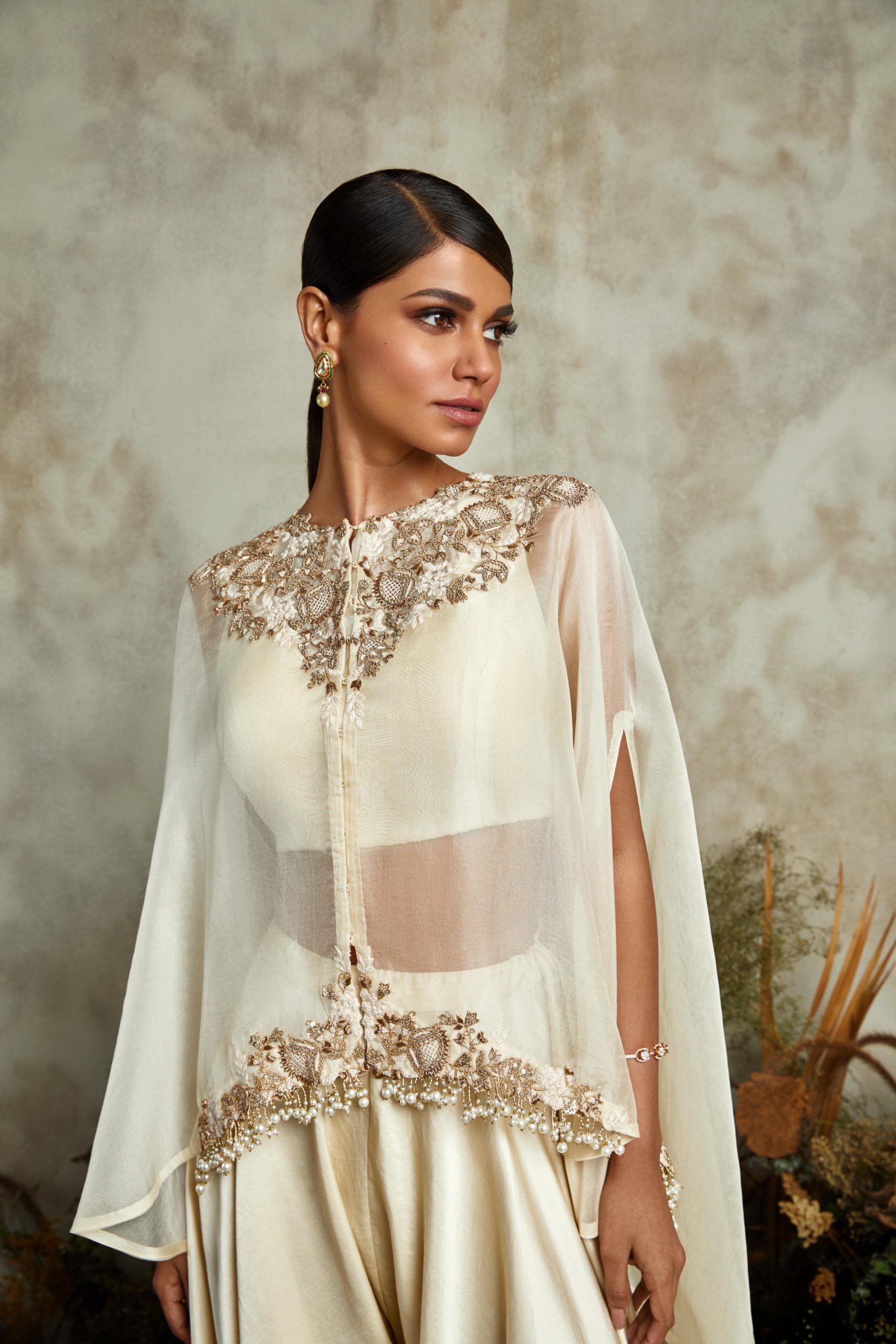 Organza umbrella cape with silk bustier and cotton satin pants