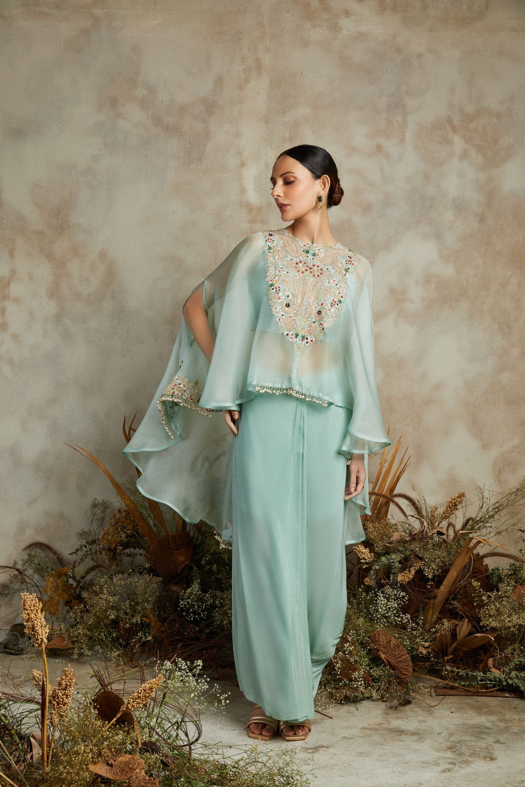 Organza umbrella cape with silk bustier and crepe pants