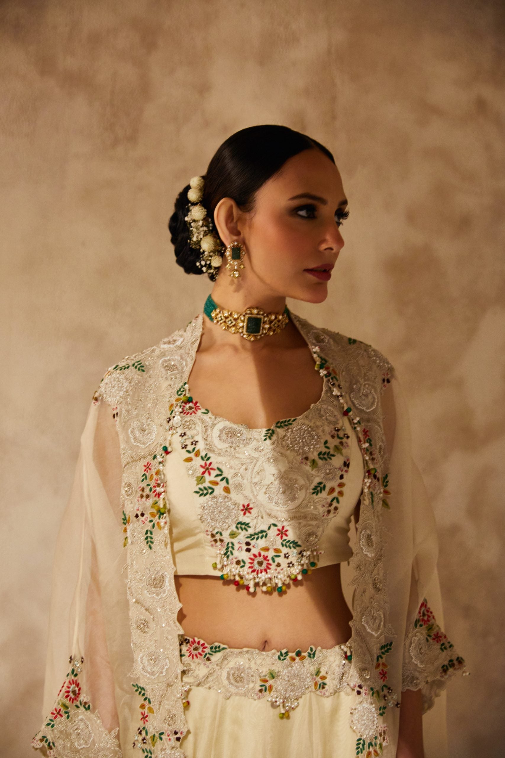 Silk blouse with organza cape and lehenga