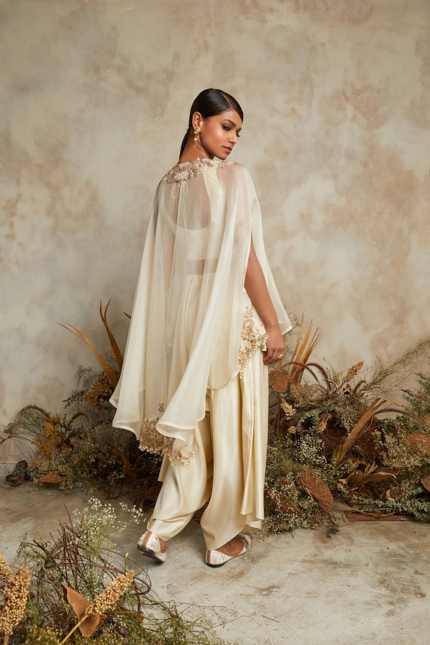 Organza umbrella cape with silk bustier and cotton satin pants
