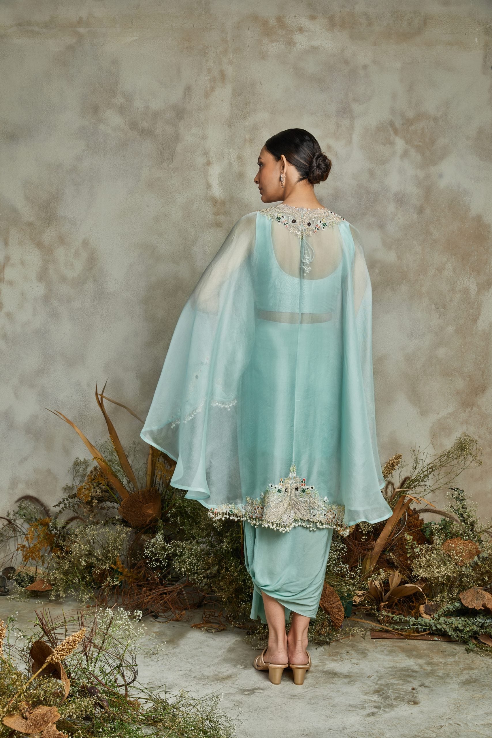 Organza umbrella cape with silk bustier and crepe pants