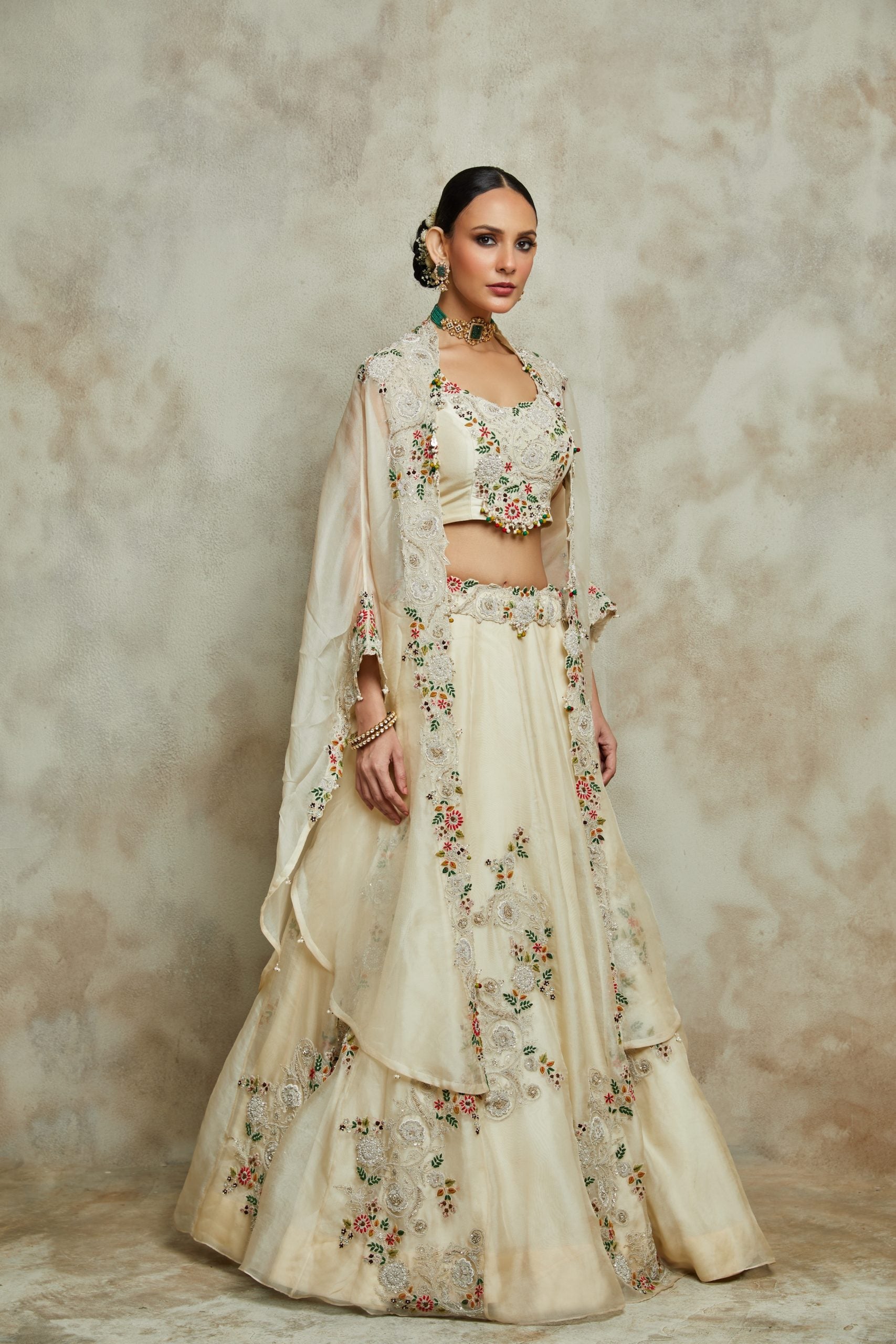 Silk blouse with organza cape and lehenga