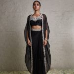 Silk blouse with organza cape and crepe skirt