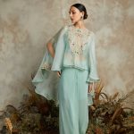 Organza umbrella cape with silk bustier and crepe pants