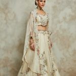 Silk blouse with organza cape and lehenga